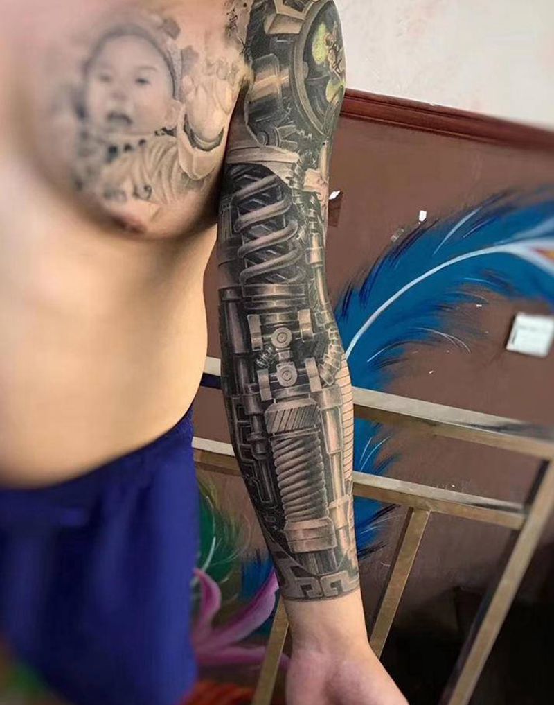 机械臂纹身图片_手臂欧美写实机械臂纹身图案