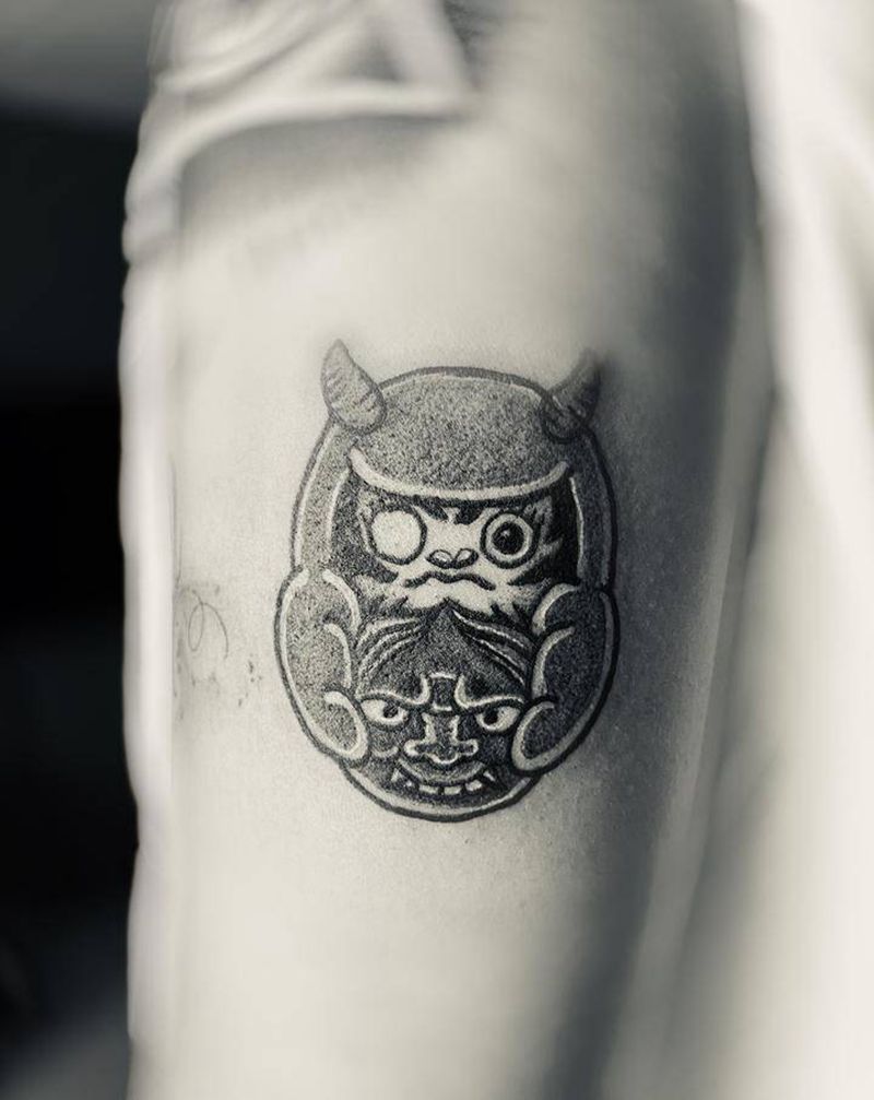 达摩蛋纹身图片_手臂纹身图案