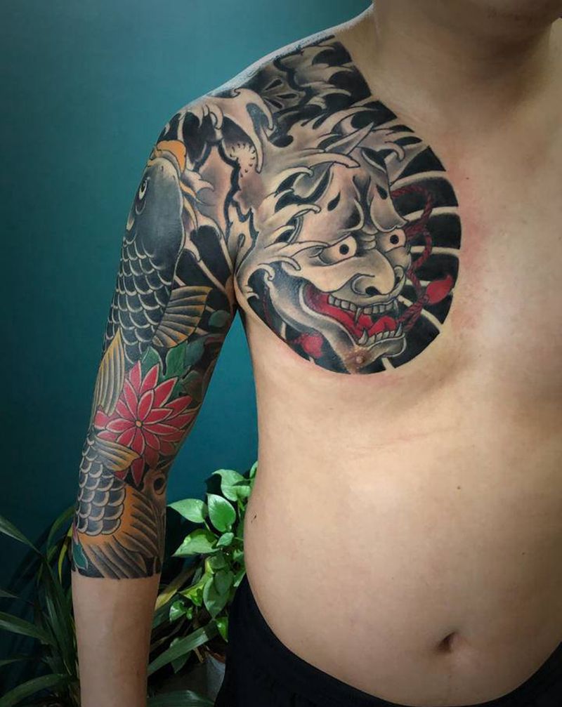 半胛七分袖纹身图片_手臂胸部老传统纹身图案