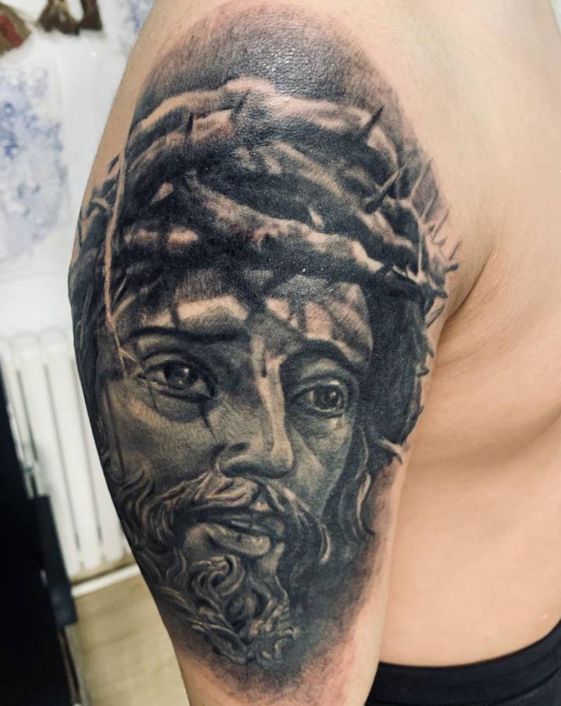 耶稣纹身图片_手臂纹身图案