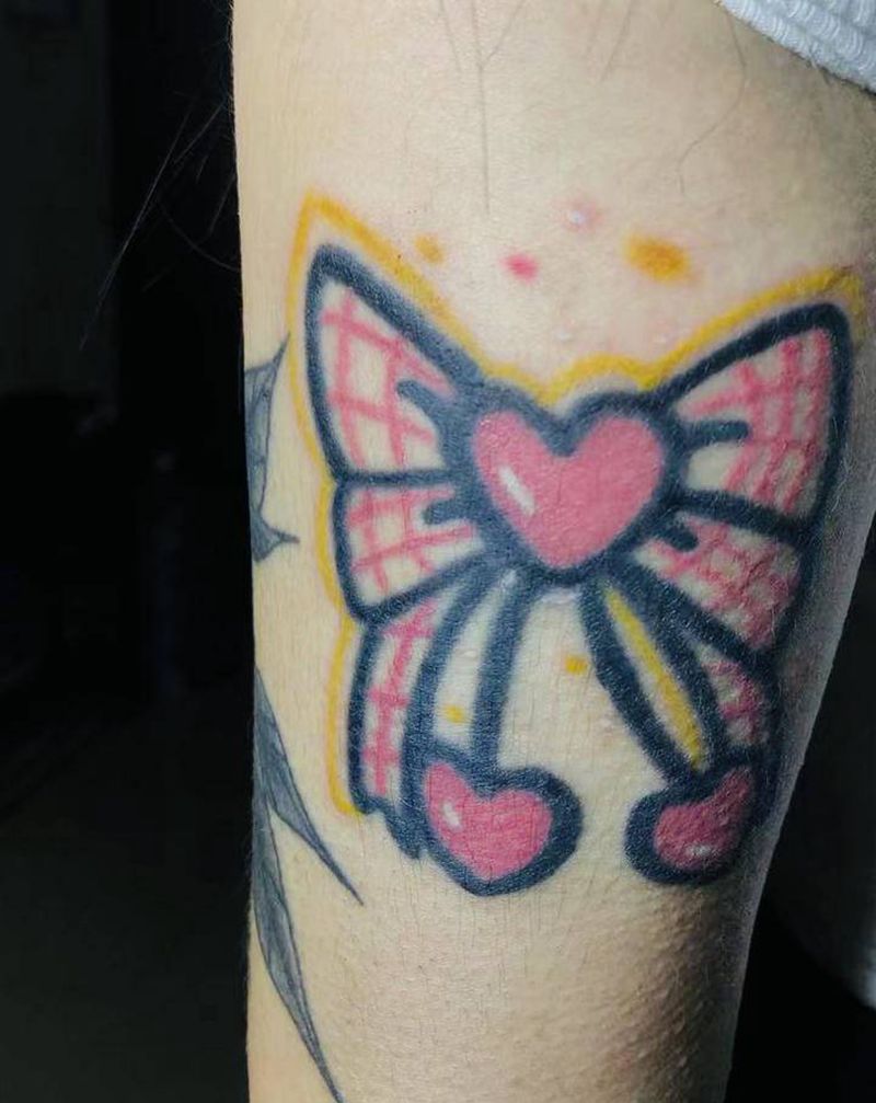 蝴蝶结纹身图片_手臂Old SchoolNew School纹身图案