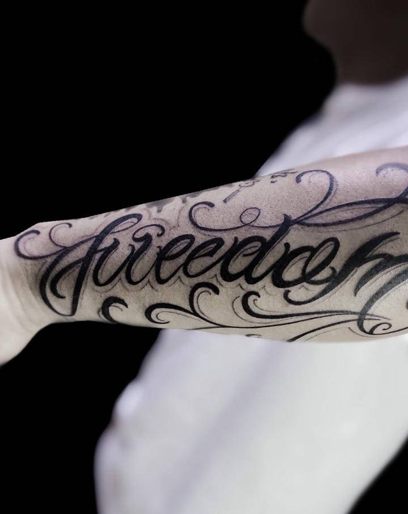 英文花体字纹身纹身图片_手臂花体字纹身图案