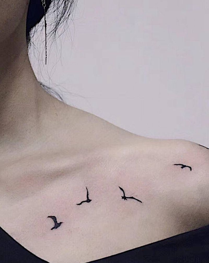 飞鸟纹身图片_胸部纹身图案