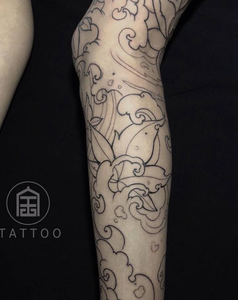 象神浪花纹身图片_腿部新传统象神浪花纹身图案