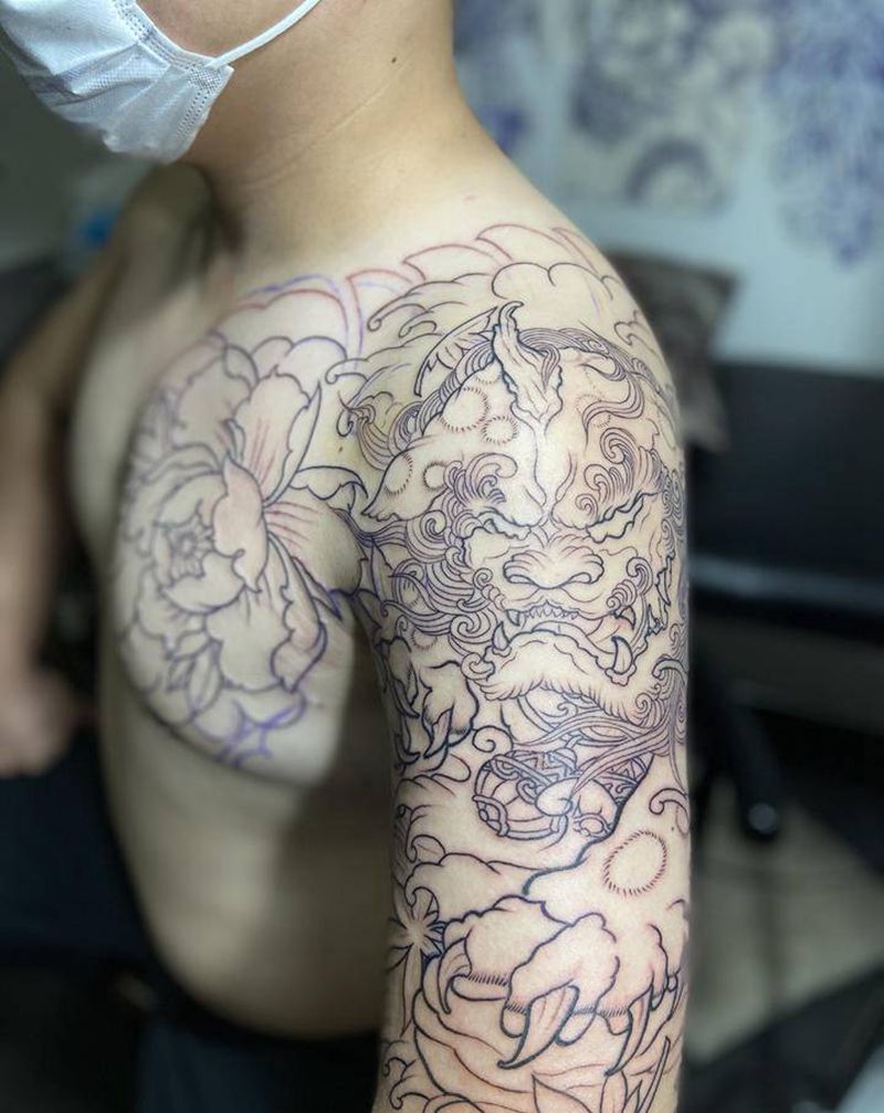 半胛、唐狮、牡丹纹身图片_胸部手臂老传统纹身图案