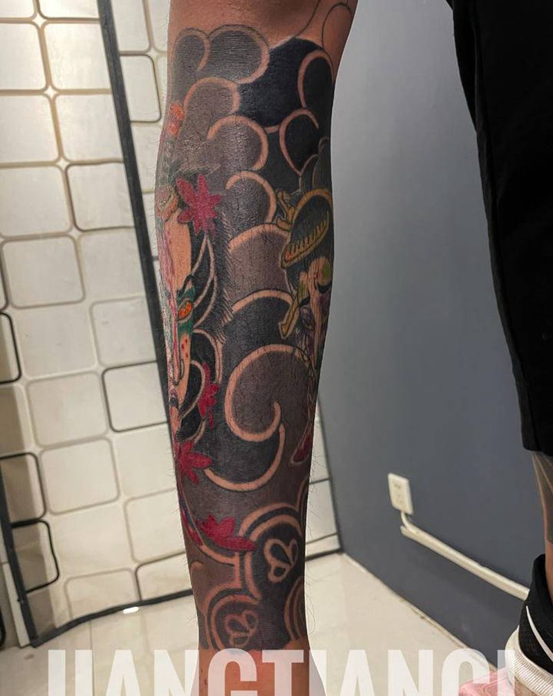 生首包小腿纹身图片_脚部老传统纹身图案