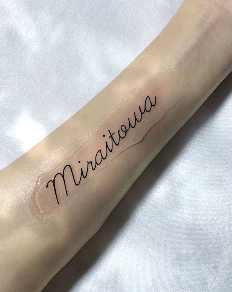 字母纹身纹身图片_手臂花体字几何字母纹身图案