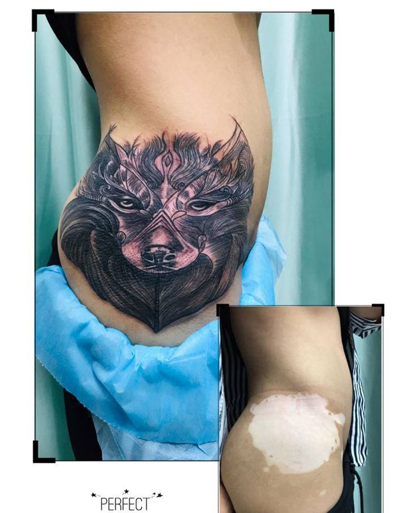 DL 白癜风遮盖纹身图片_腰部老传统纹身图案