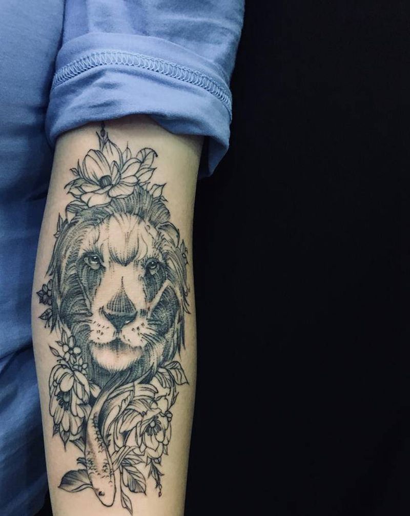 大西纸纹身图片_手臂素花，狮子纹身图案