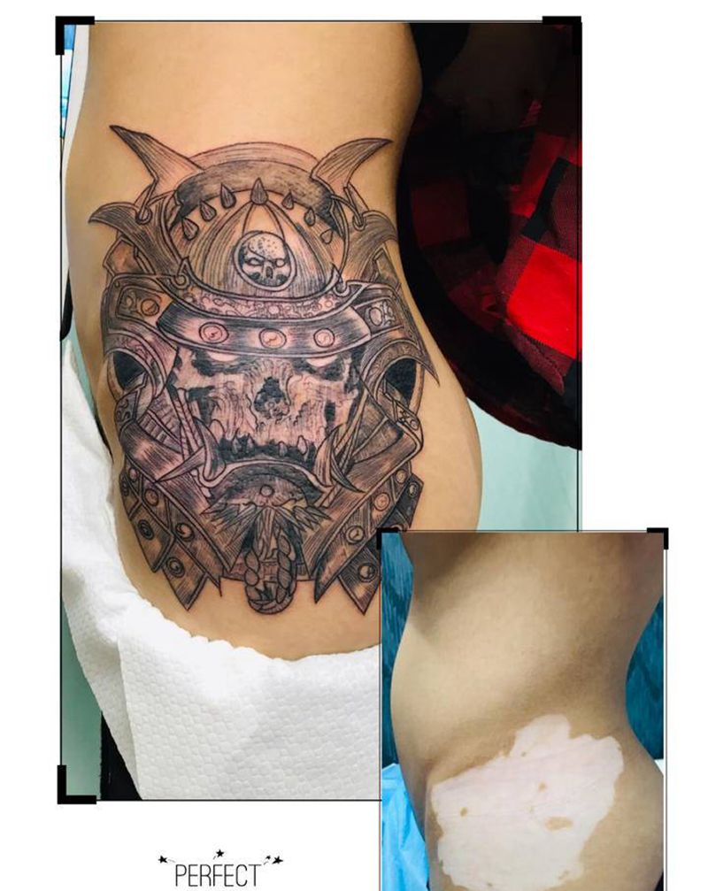 DL 白癜风遮盖纹身图片_腰部老传统纹身图案