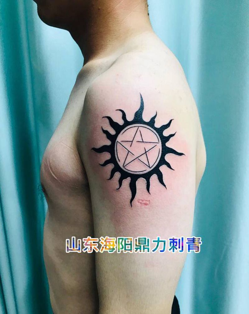 DL  大臂太阳图腾纹身图片_手臂图腾纹身图案