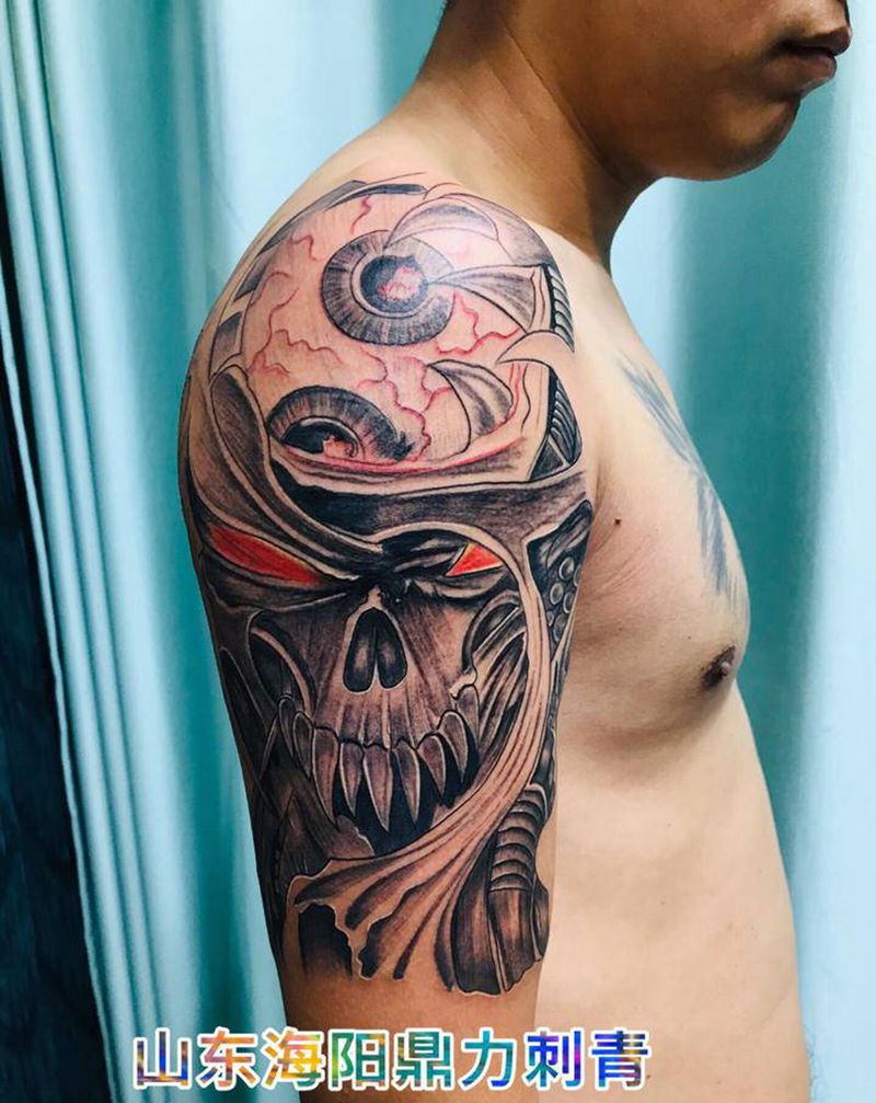 DL 大臂骷髅机甲纹身图片_手臂欧美写实纹身图案