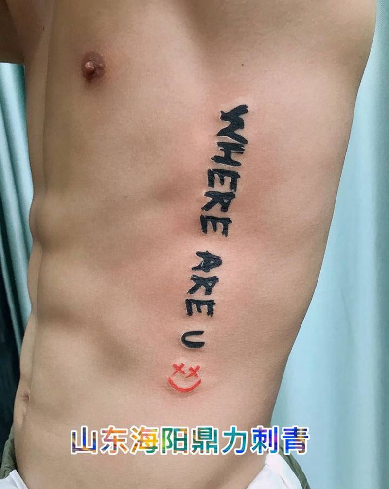 DL 侧肋字母控纹身图片_腰部老传统纹身图案