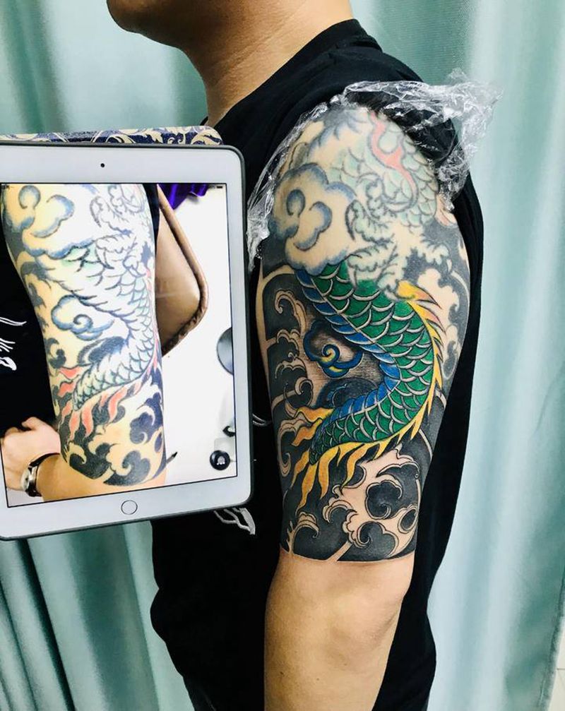 DL 老龙尾翻新纹身图片_手臂老传统纹身图案