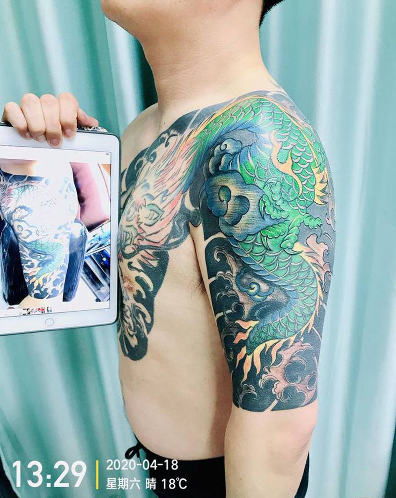 DL 老龙翻新纹身图片_手臂老传统纹身图案