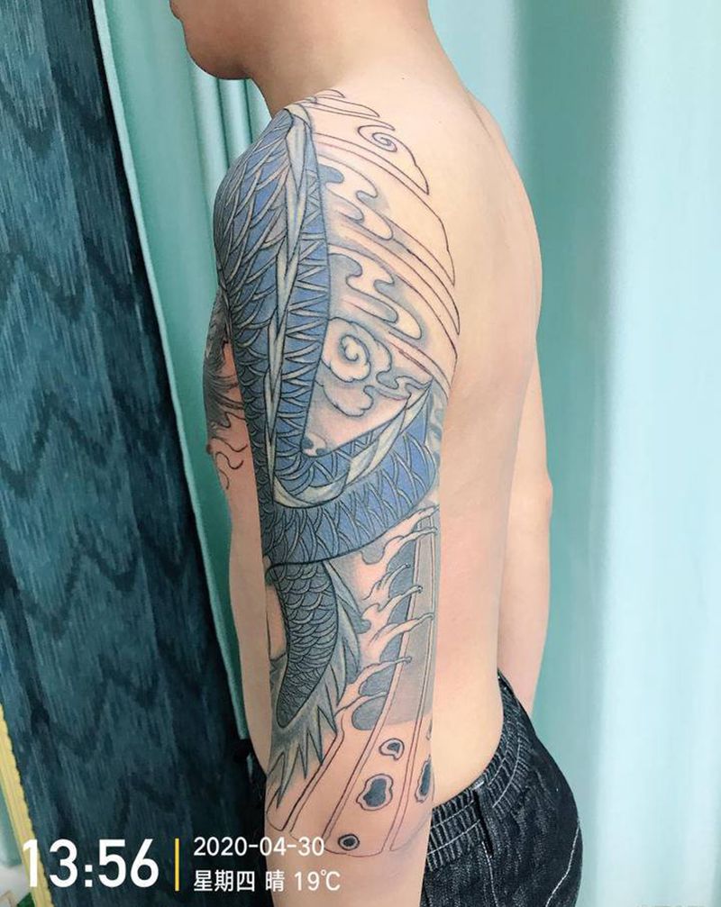 DL老龙翻新纹身图片_手臂胸部老传统纹身图案