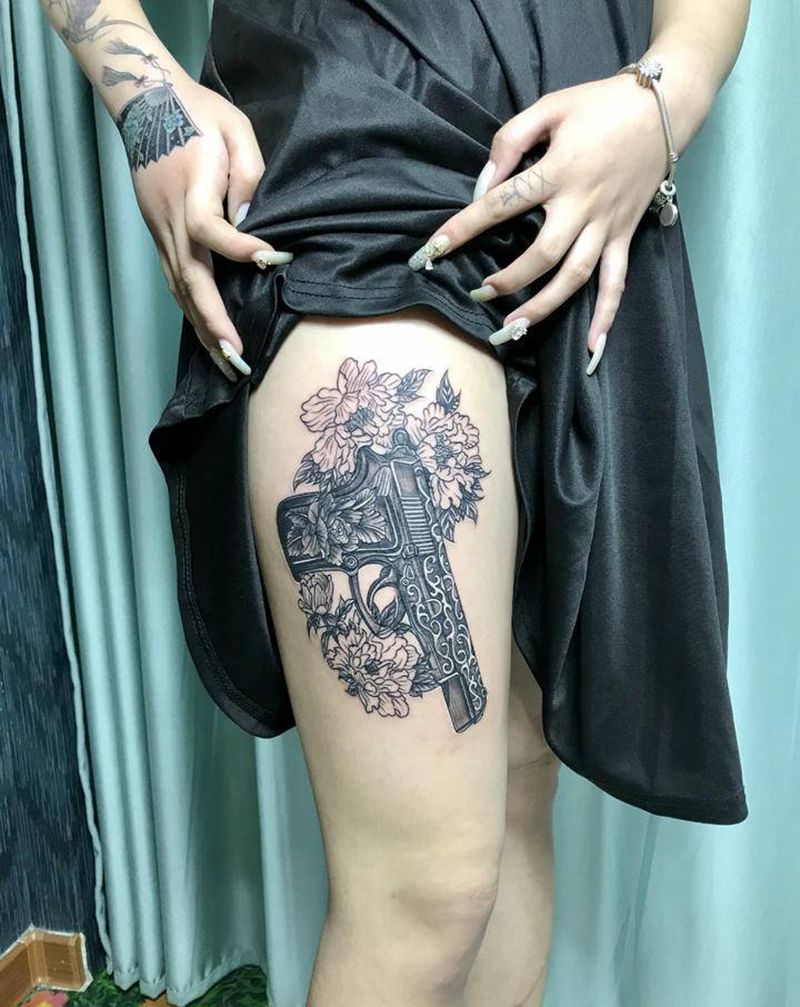 DL 大腿枪加牡丹纹身图片_腿部新传统纹身图案