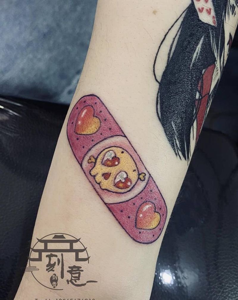 创口贴纹身图片_手臂小清新纹身图案