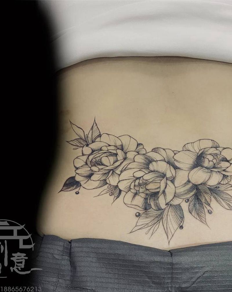 素花疤痕遮盖纹身图片_腰部素花遮盖纹身图案