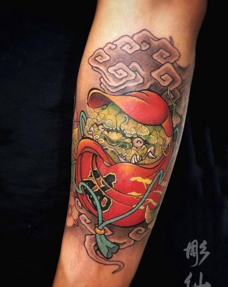 达摩狮纹身图片_手臂新传统纹身图案
