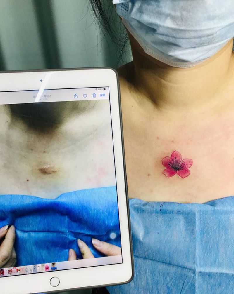 DL疤痕遮盖纹身图片_胸部老传统纹身图案