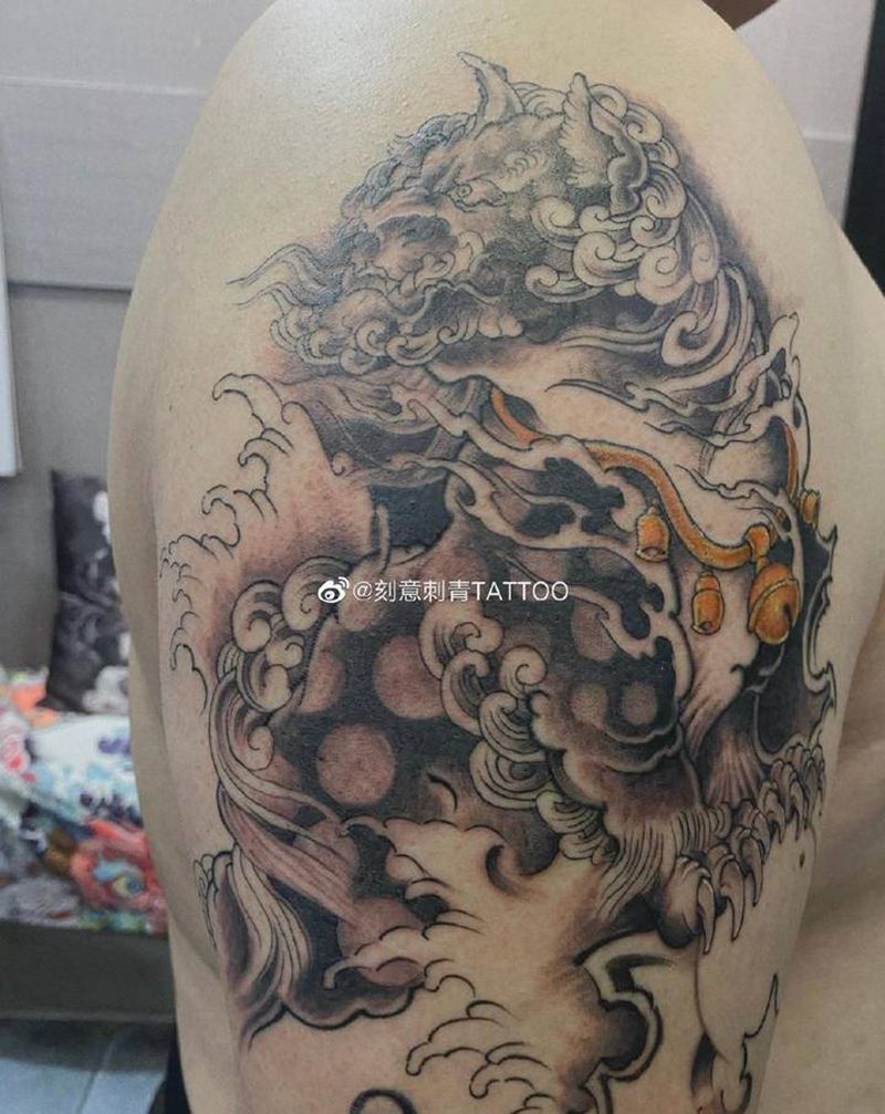 唐狮纹身图片_手臂新传统唐狮纹身图案