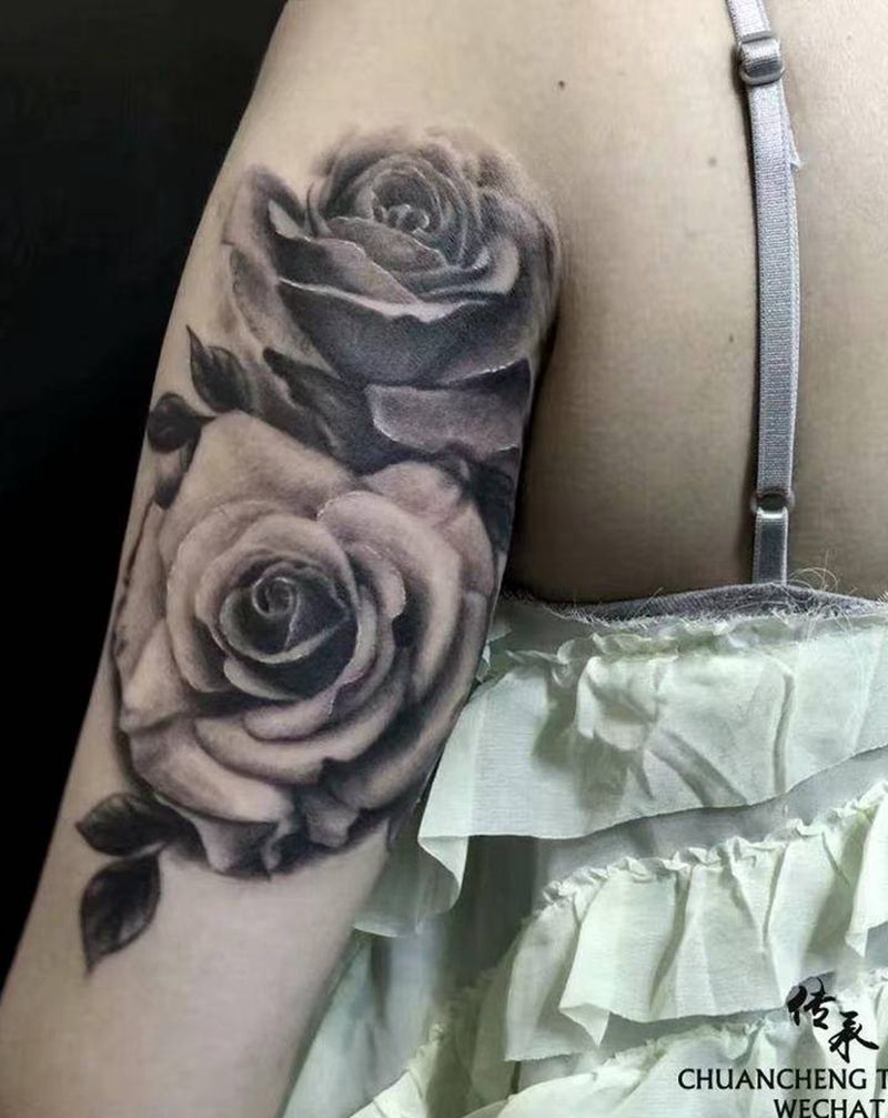 花卉纹身图片_手臂欧美写实纹身图案