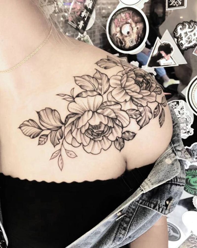 素花纹身图片_颈部胸部点刺纹身图案