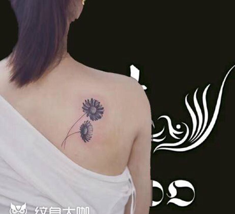 太阳花纹身图片_手臂纹身图案