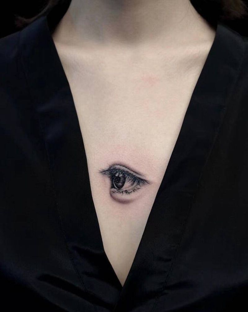 你的眼神纹身图片_胸部欧美写实纹身图案