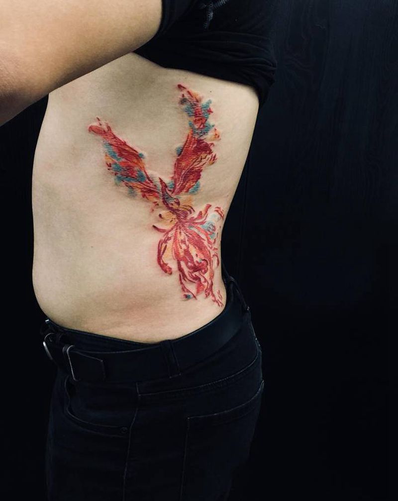 凤凰纹身图片_腰部纹身图案