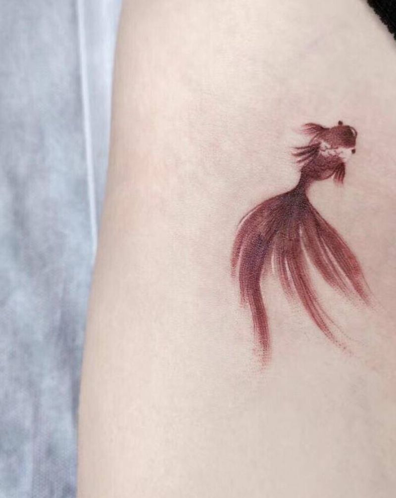 双鱼纹身图片_腿部水彩纹身图案