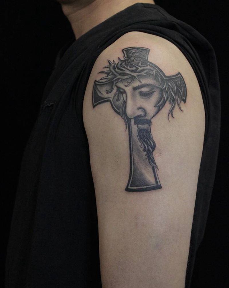耶稣纹身图片_手臂欧美写实纹身图案
