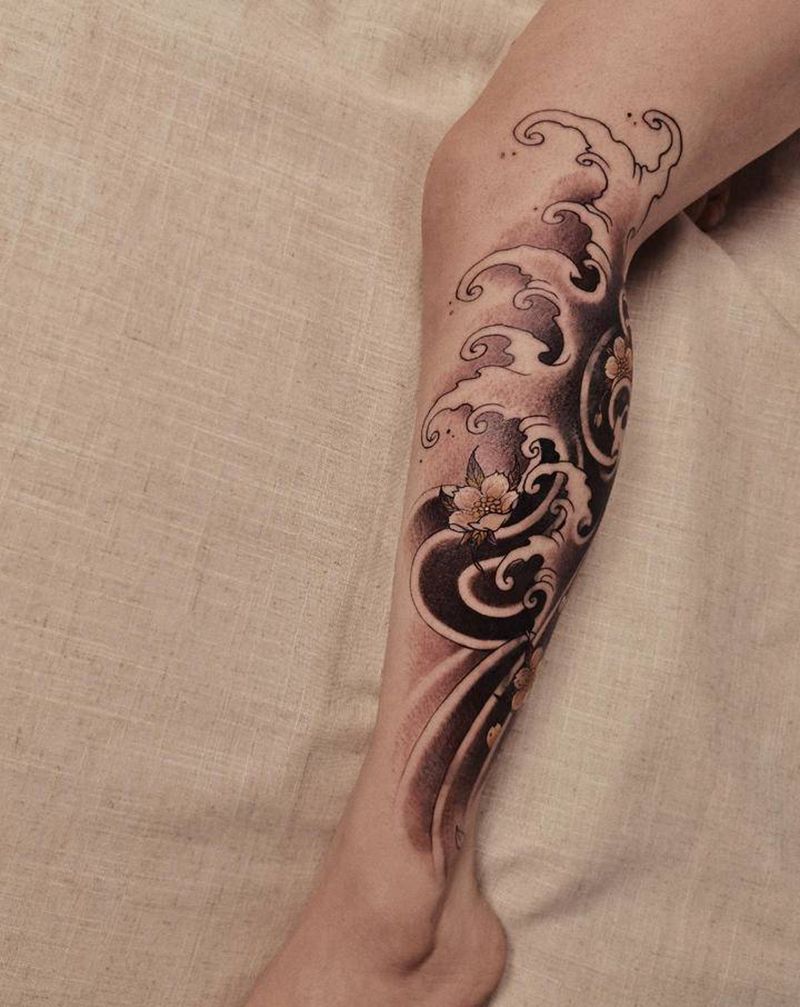 /水浪遮盖纹身图片_腿部新传统纹身图案