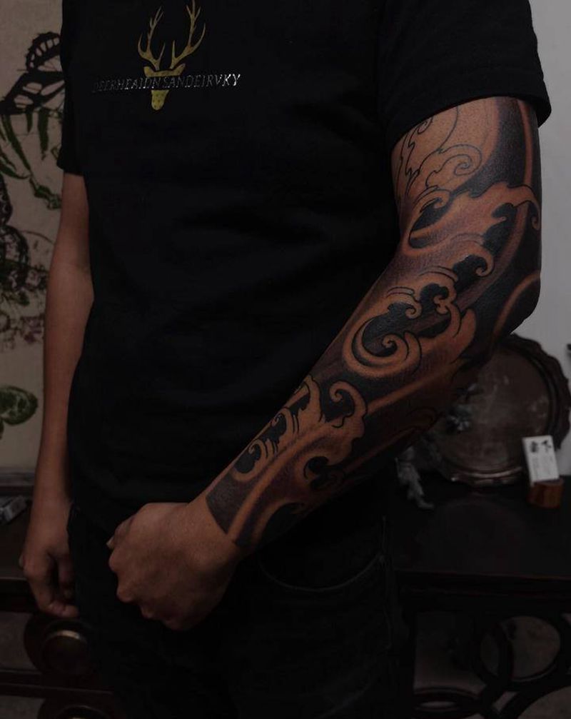 浪臂/第二回合纹身图片_手臂新传统纹身图案