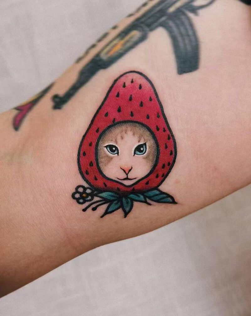 顾客家的小猫咪纹身图片_手臂Old School纹身图案