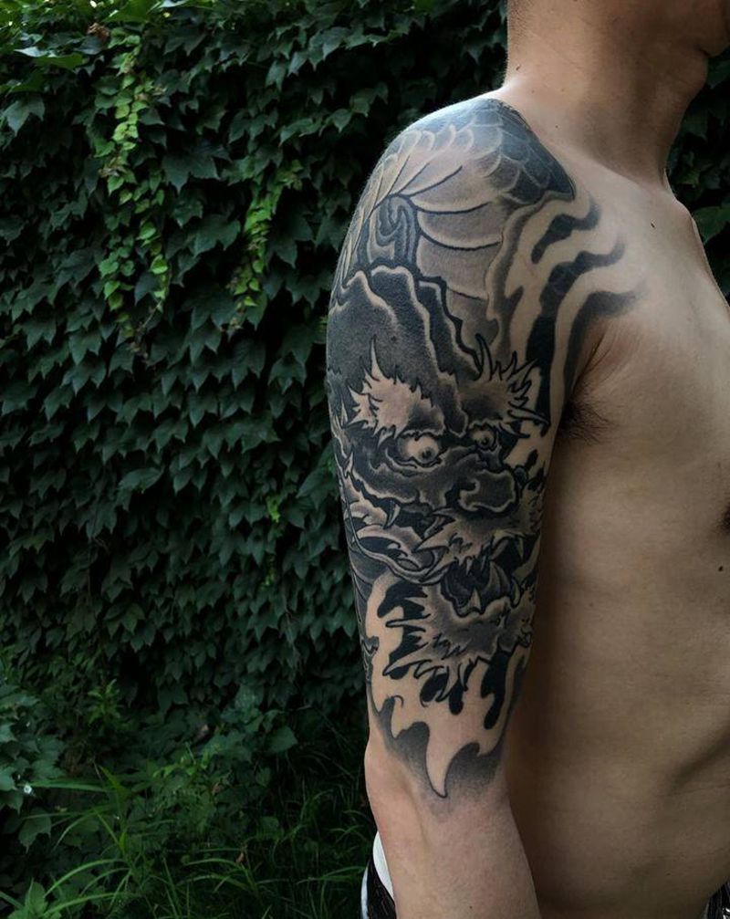 龙（恢复后）纹身图片_手臂新传统纹身图案