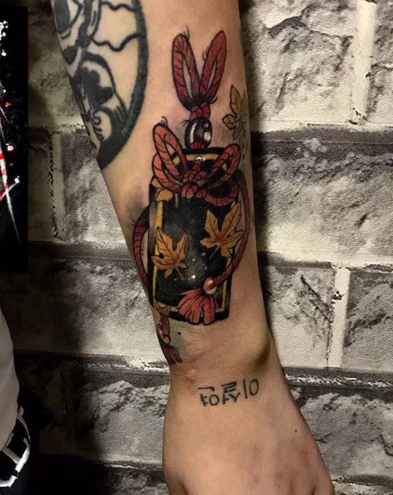 令牌纹身图片_手臂纹身图案