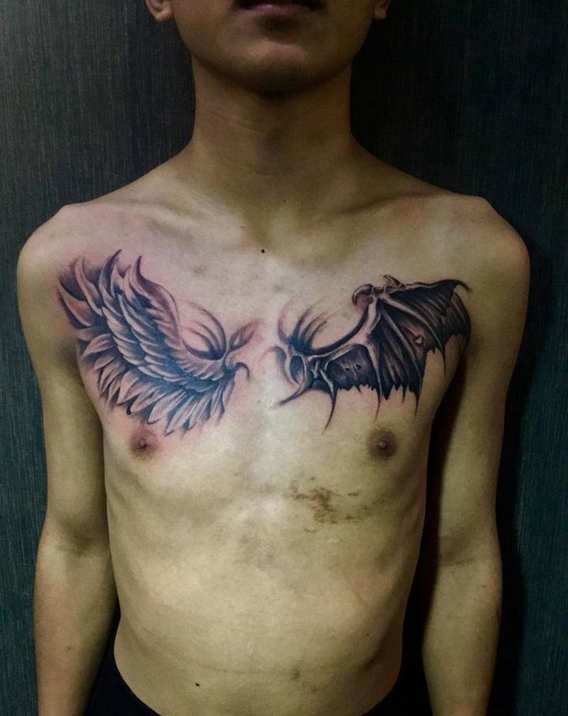 善恶翅膀纹身图片_胸部纹身图案