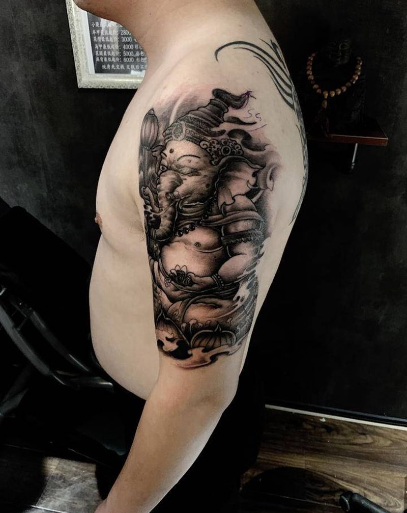 大臂象神纹身图片_手臂老传统新传统纹身图案