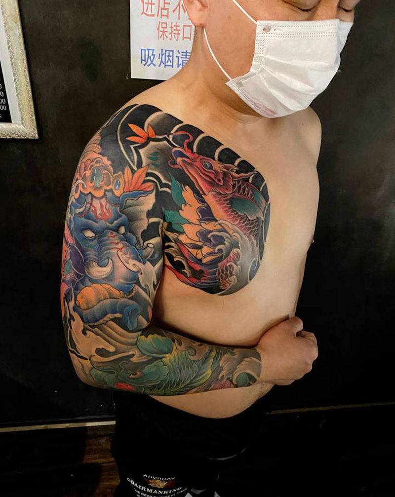 花臂纹身图片_手臂老传统新传统纹身图案