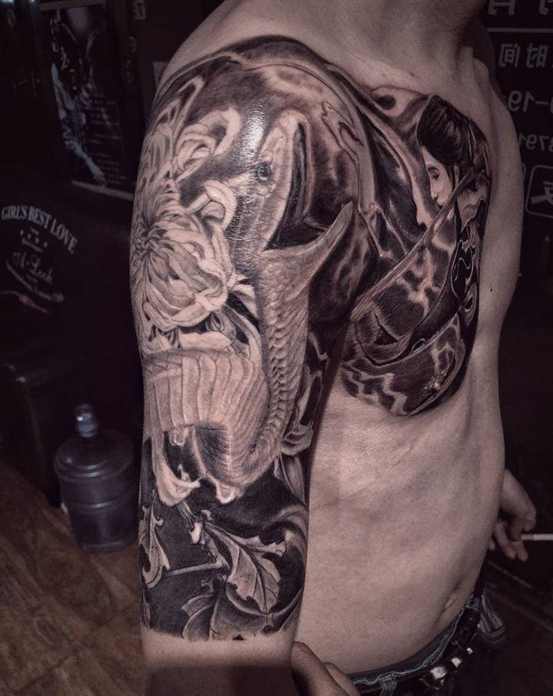 黑曼巴纹身图片_胸部手臂欧美写实纹身图案