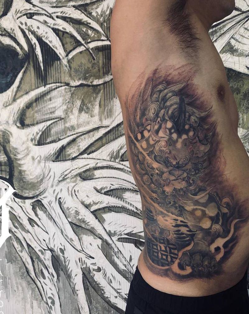 谛听纹身图片_腰部新传统纹身图案