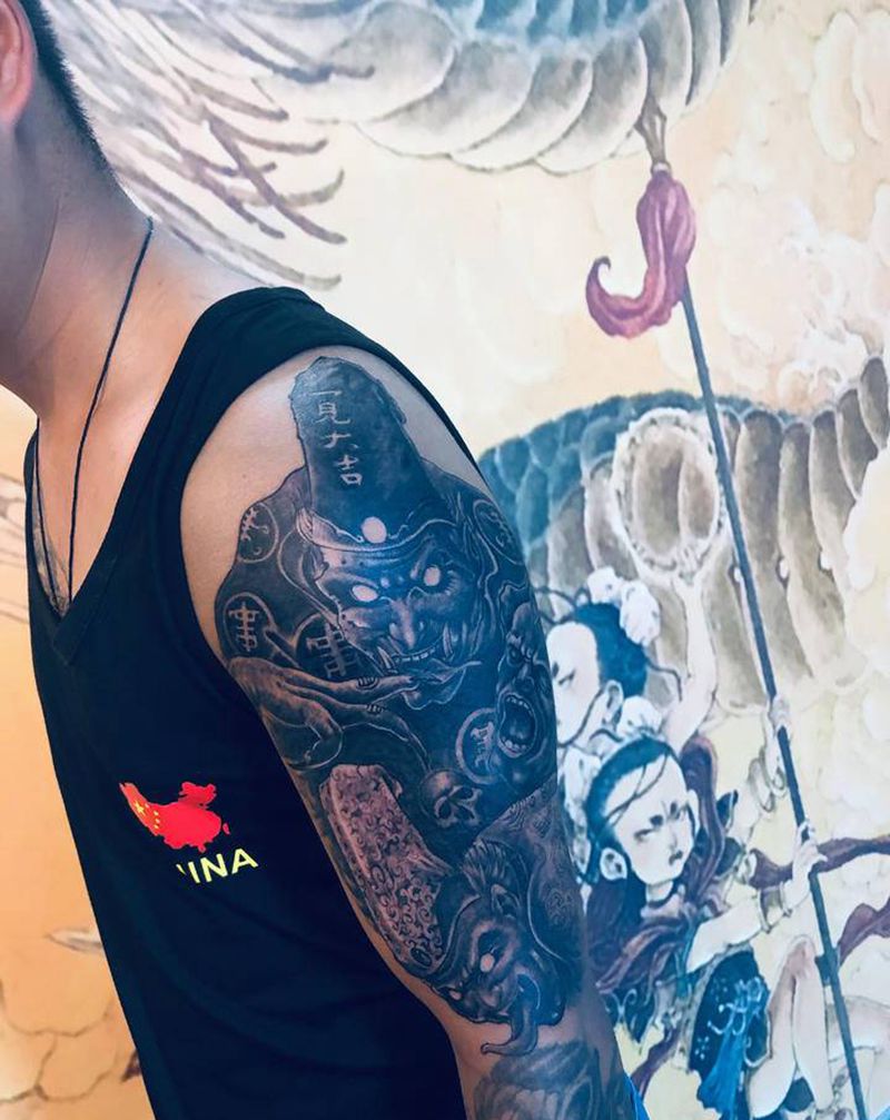 黑白无常纹身图片_手臂纹身图案