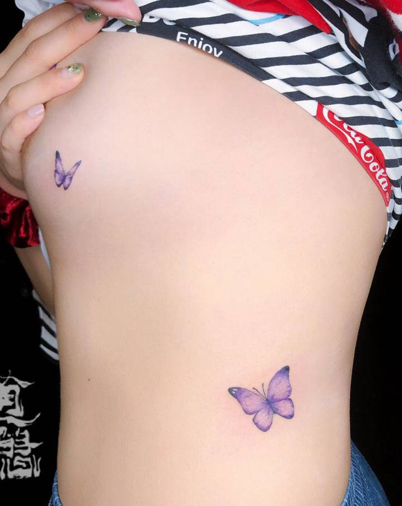 蝴蝶纹身图片_腹部胸部水彩蝴蝶纹身图案