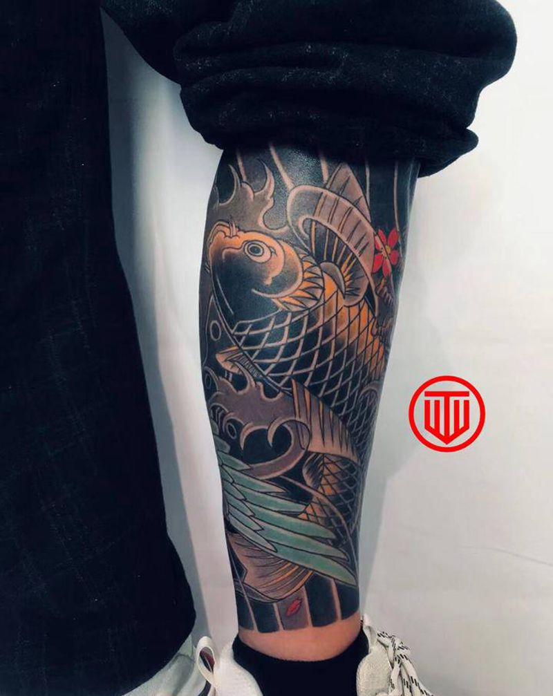 老传统风格 鱼纹身图片_腿部老传统纹身图案