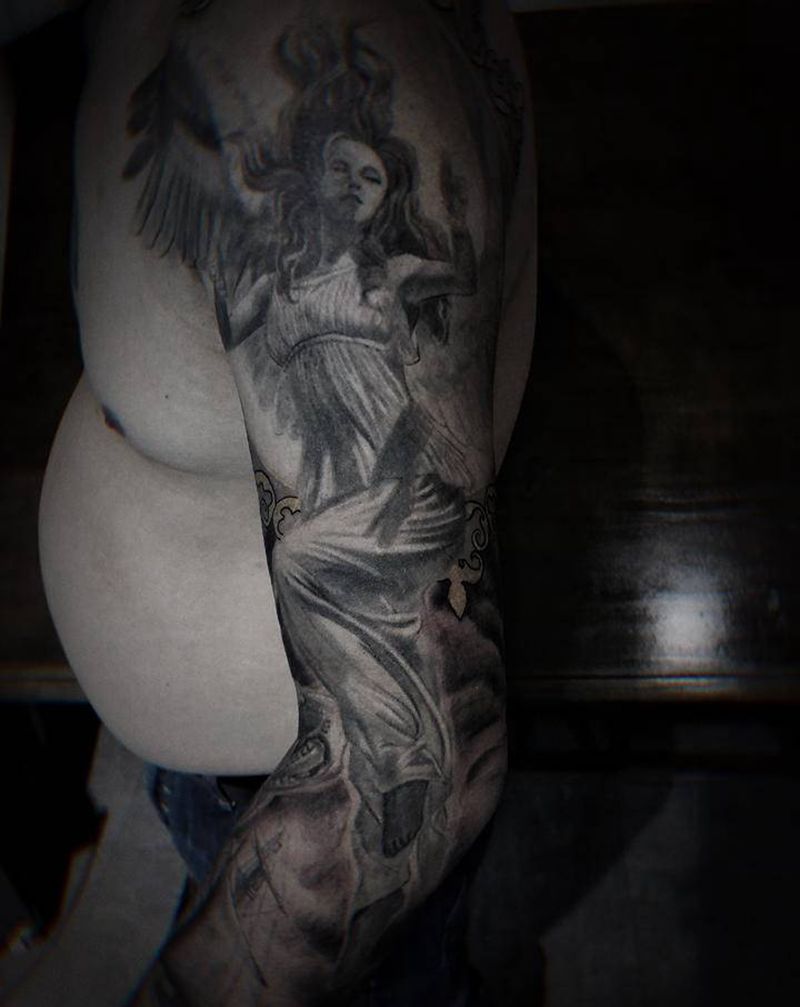 写实花臂纹身图片_手臂欧美写实纹身图案