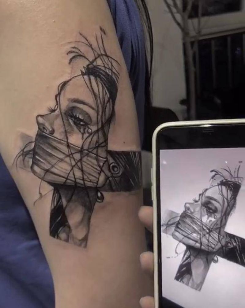 小图一枚纹身图片_手臂欧美写实纹身图案