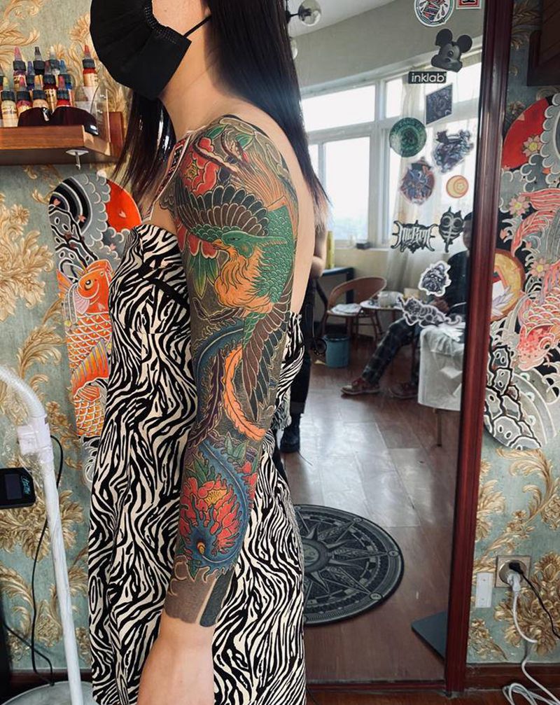 凤凰花臂纹身图片_手臂老传统凤凰纹身图案