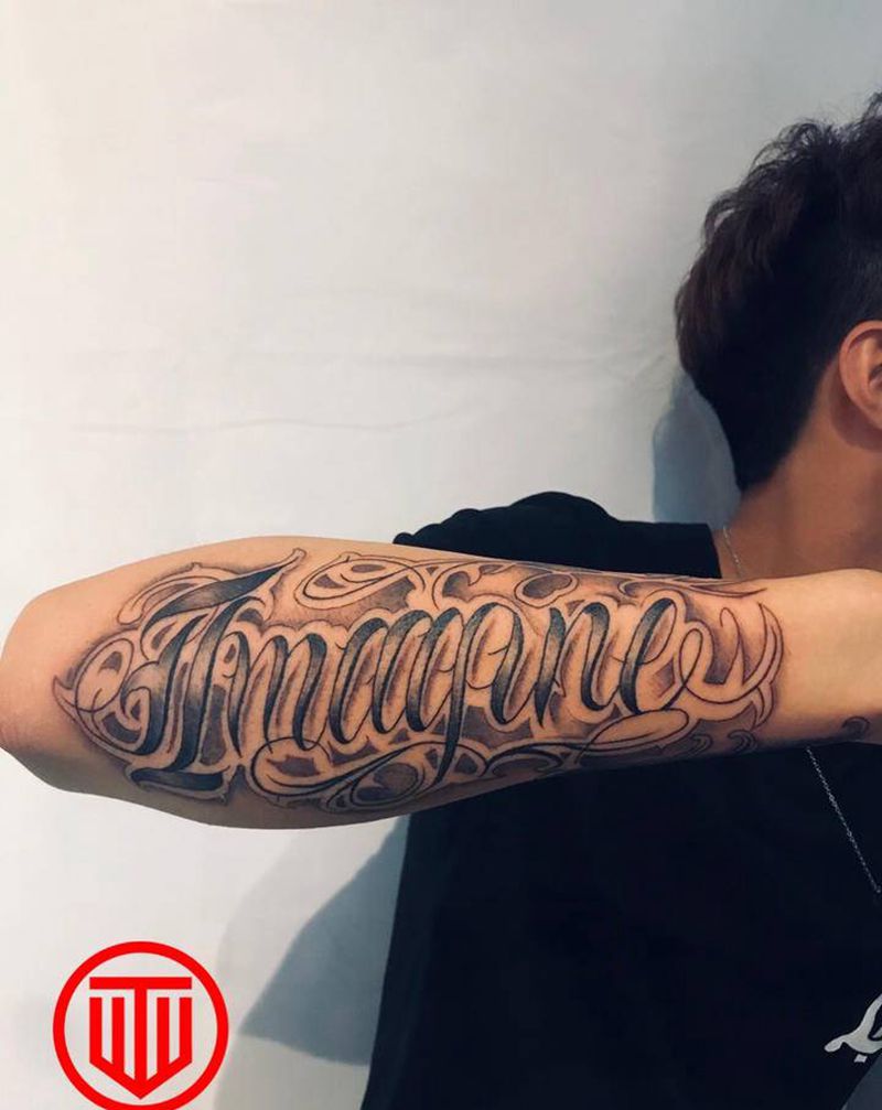 花体字纹身图片_手臂花体字纹身图案